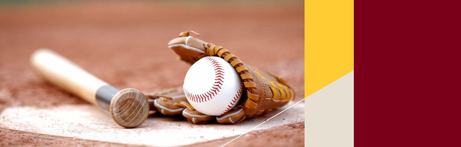 A baseball, glove, and bat sit at home plate.