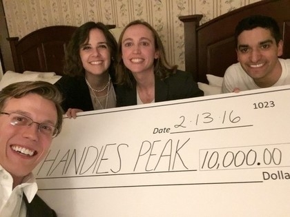 Students Holding Check of $10,000