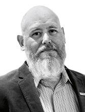 Black and white headshot of Chris Swanson, ’09 MBA