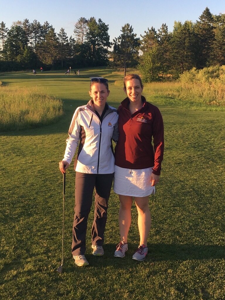 Interns Merritt and Stefanie Golfing