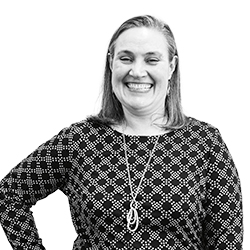 Faces of Carlson: Black and white photo of Melinda Pavek, ’03 MBA