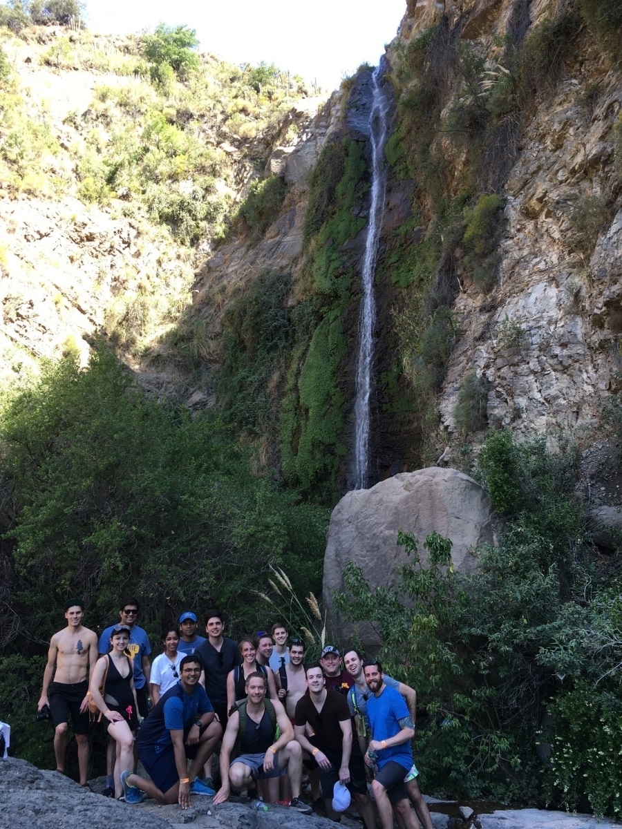 Students in front of a Waterfall in the Andes