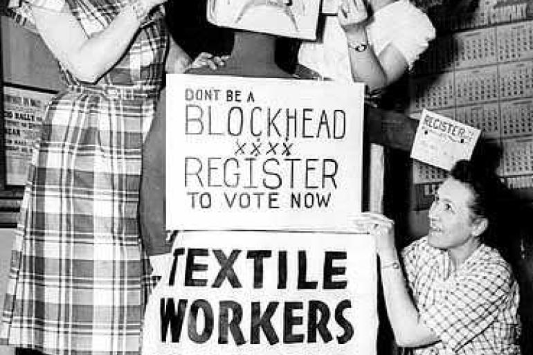 Textile workers promoting voter registration