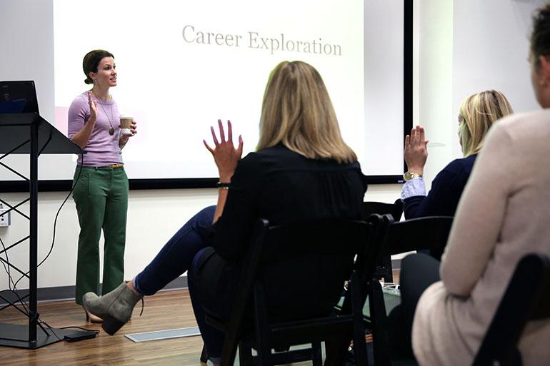 Woman giving a presentation on career exploration