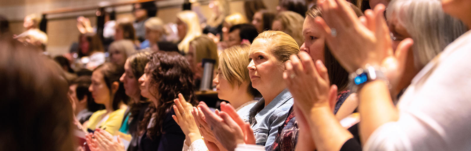 Attendees applaud at the 2019 Women's Leadership Conference