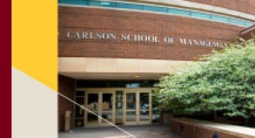 The Carlson School building in summer.
