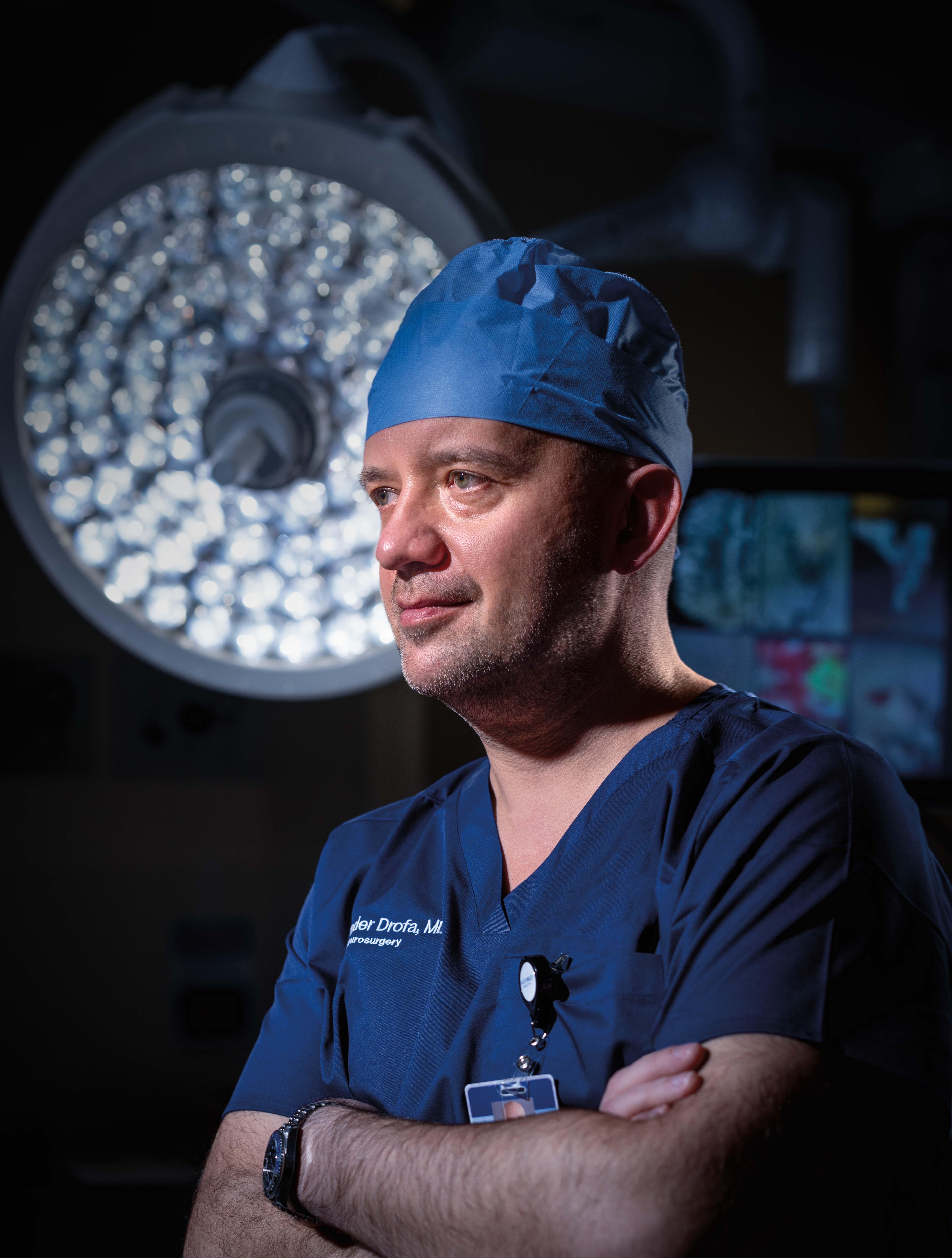 Dr. Drofa posing in an operating room