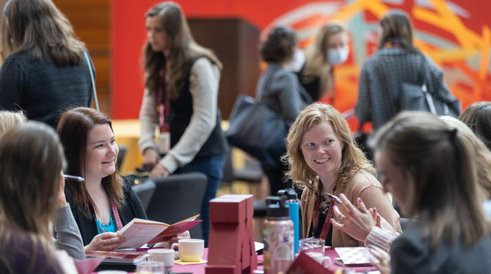 Attendees converse with each other during the 2022 Women's Leadership Conference