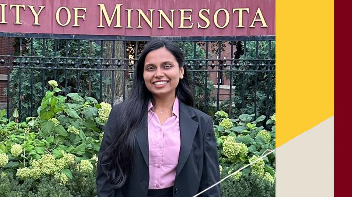 Disha Rane standing in front of sign that says "University of Minnesota"