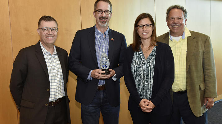 From left to right: Jeff Bieganek (executive director, MBA Roundtable); Phil Miller (assistant dean, Carlson MBA and MS programs); Tina Mabley (assistant dean, McCombs School of Business); and Joe Fox (president, MBA Roundtable). (Jim Roese Photography)