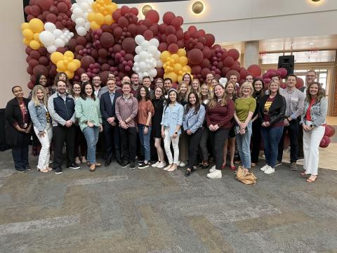 Carlson alumni board and Gophers of the Last Decade Board posing for group photo.