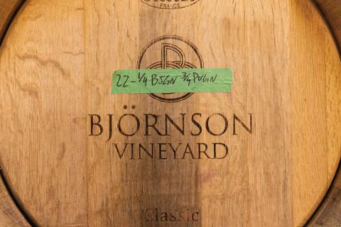 Wine barrel with Bjronson Vineyard imprinted on it.