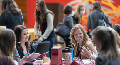 Attendees converse with each other during the 2022 Women's Leadership Conference