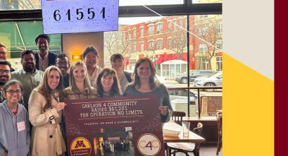 Members of the Carlson 4 Community student group pose for a photo with their record-breaking fundraising total.