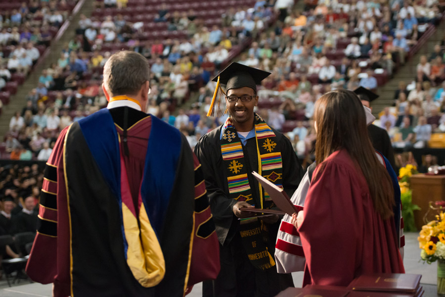 Student Receiving Degree at Undergraduate Commencement