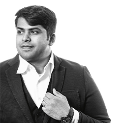 Faces of Carlson: Black and white photo of Varun Grover, ’20 FTMBA